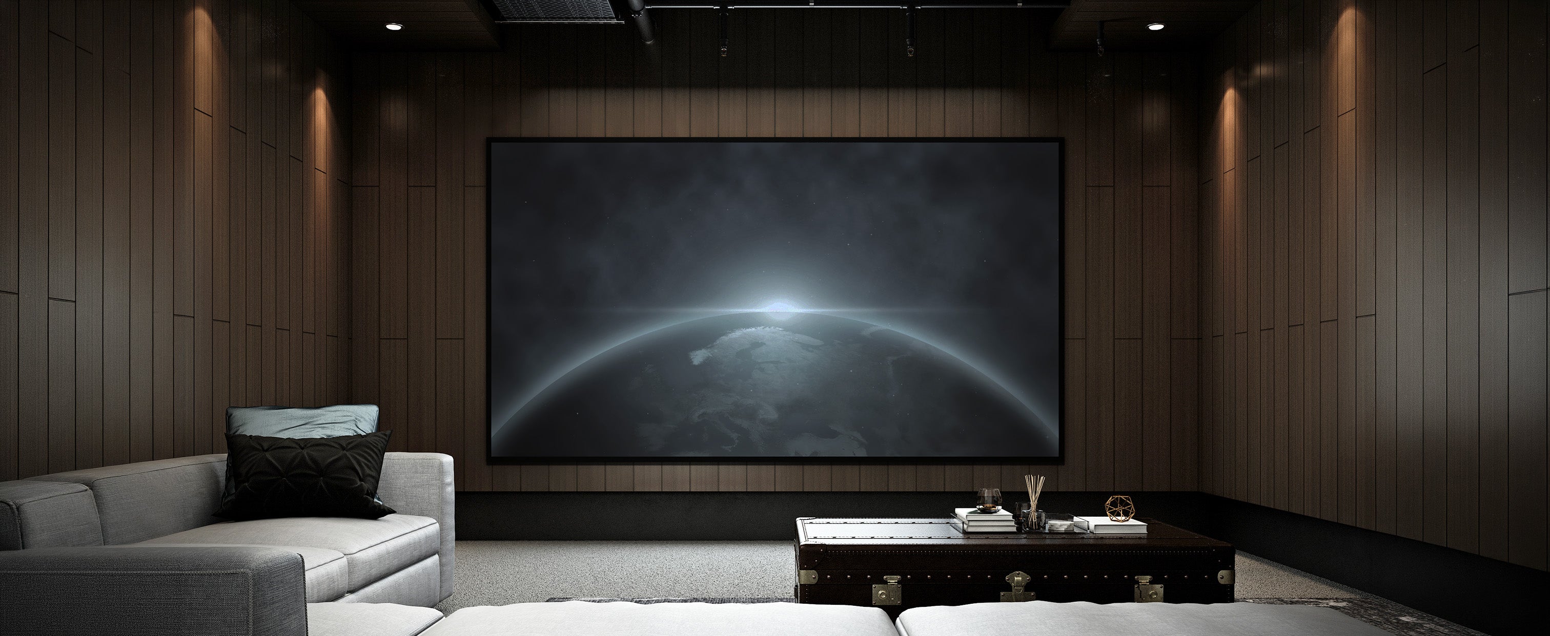 Luxury home theater with large screen, ambient lighting, and modern seating for immersive audio visual experience
